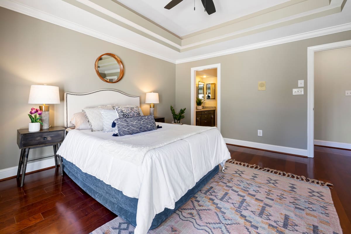 A stylish modern bedroom featuring elegant décor and lighting, perfect for interior design inspiration.