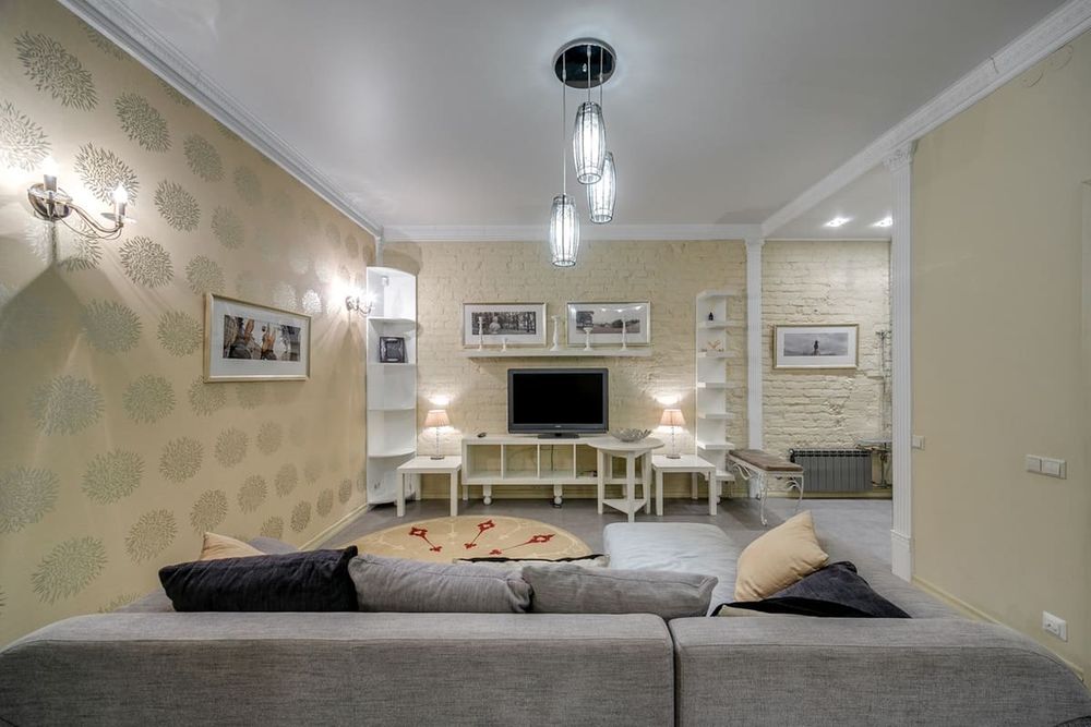 Elegant living room featuring modern decor, neutral tones, and ambient lighting.