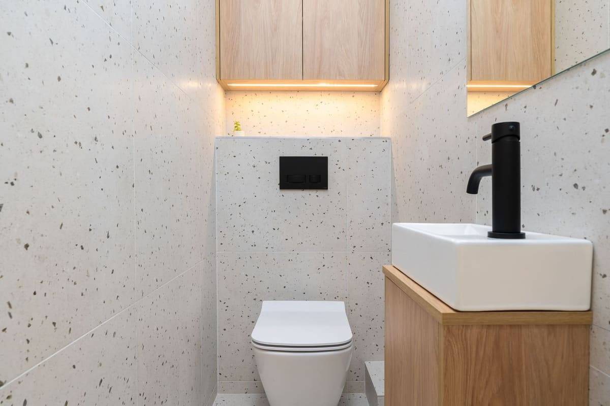 Elegant minimalist bathroom with modern fixtures in Krakow, Poland.